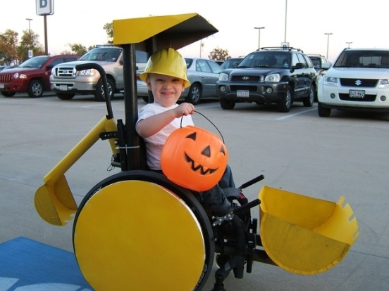a child dressed as a bulldozer