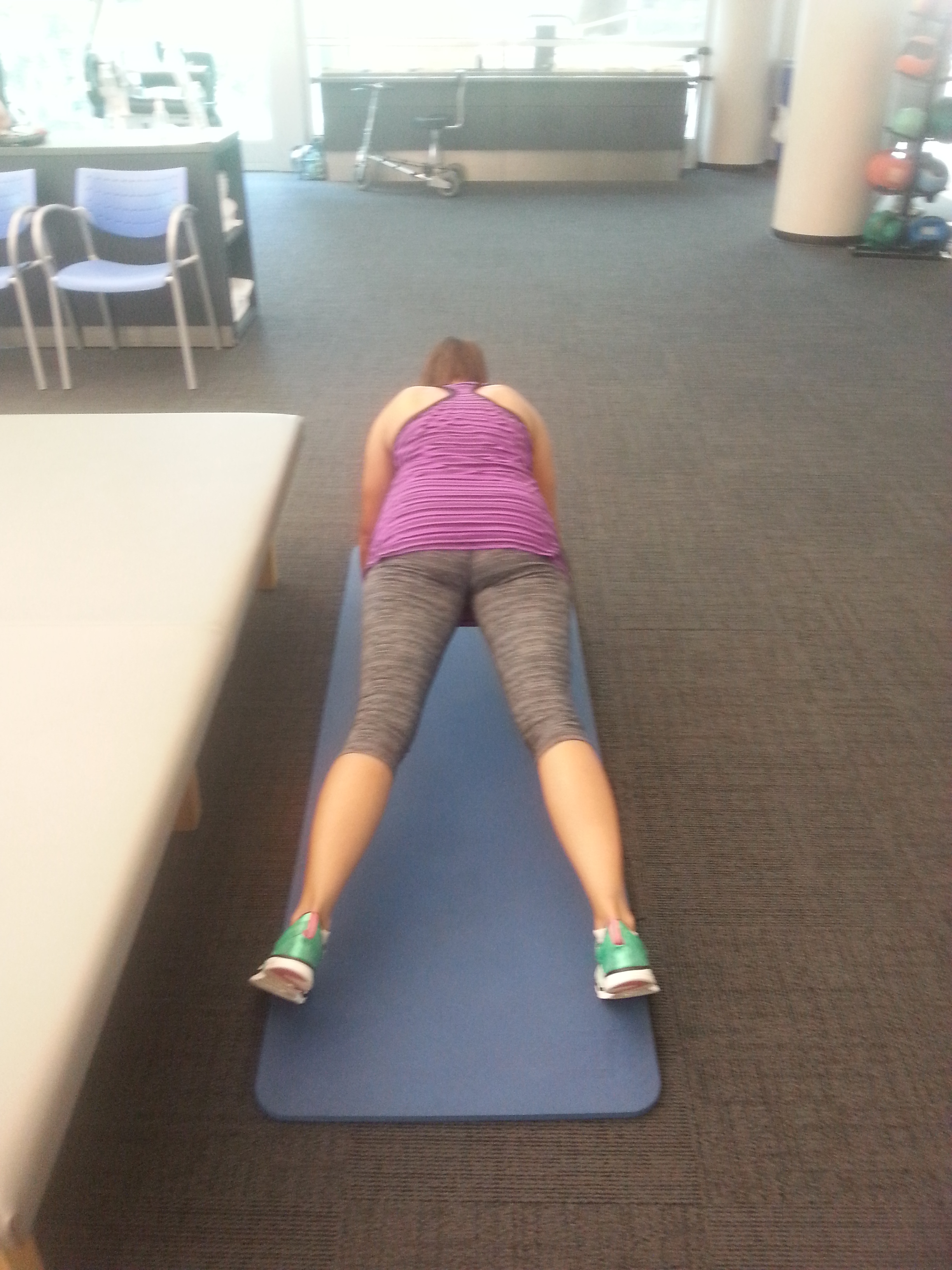 the out feet position for plank jacks