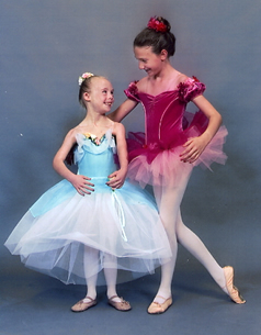 Two young girls in their ballet dresses