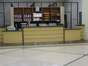 A front desk with two lower sections cut out