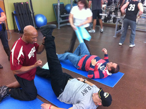 A veteran is getting his daily dose of exercise with his personal trainer.