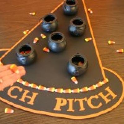 witchs hat and cauldrons set up for the witch pitch game