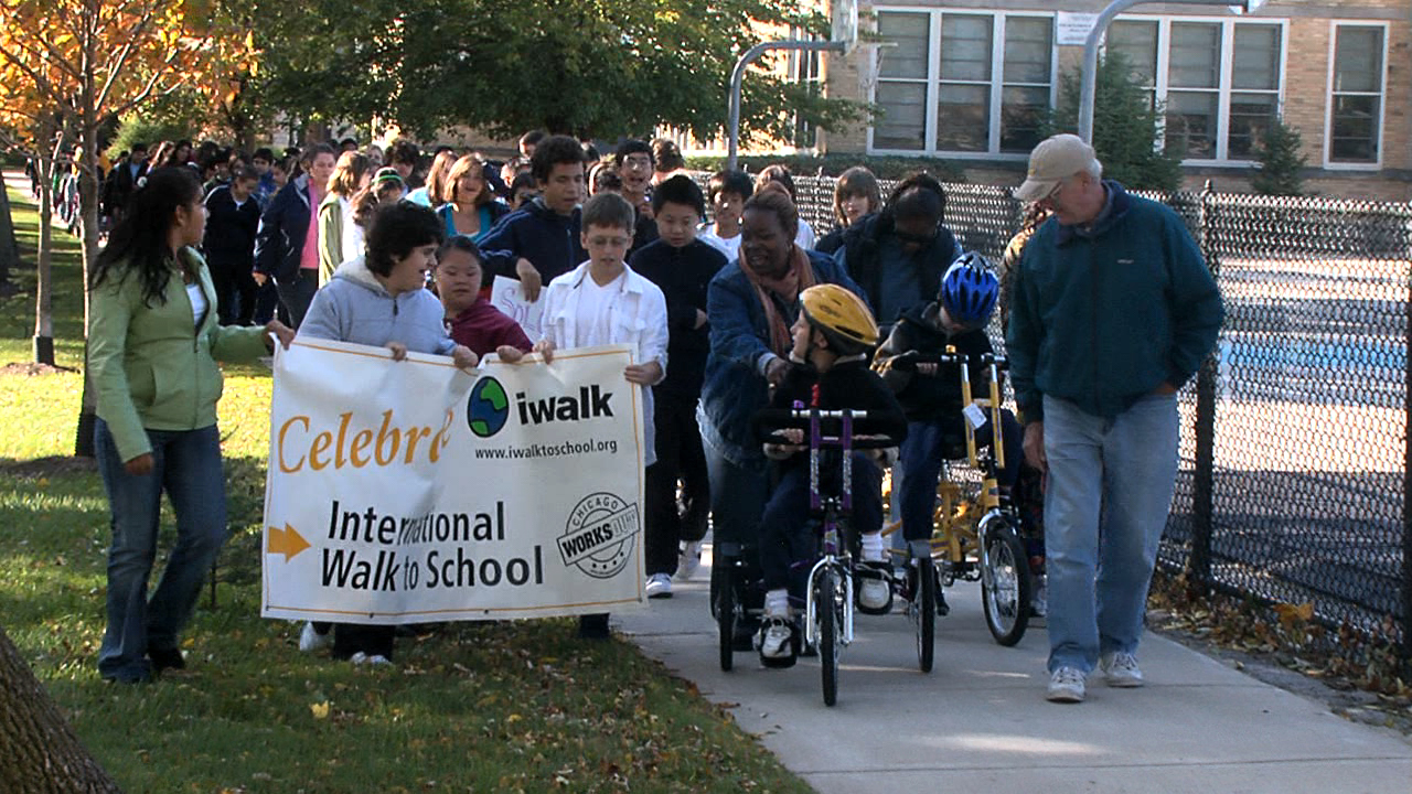 students and volunteers participate in safe routes to school