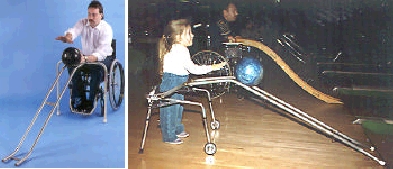 A man using a wheelchair and a young girl using a walker bowls with ball ramps