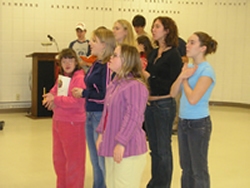 Group of students with and without disabilities rehearsing the play Fiddler on the Roof