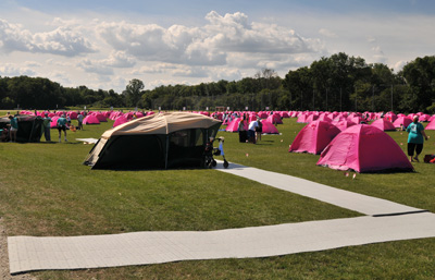 Synthetic surface along the pathway to the accessible tents was used to make the grassy terrain accessible.