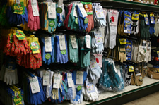 Off-the-shelf garden gloves in store display