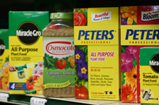 Photograph showing several brands of fertilizer