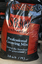 A 3.8 cubic foot plastic bag of Sunshine brand soilless mix