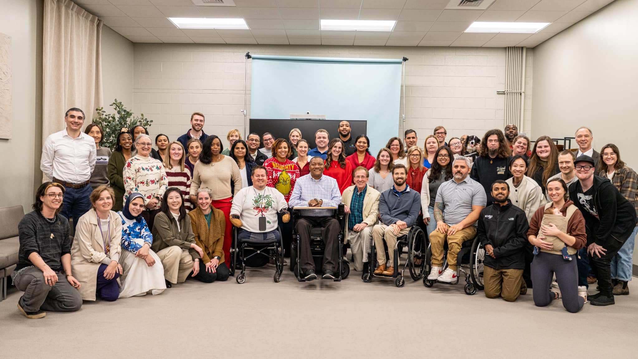 A photo of many individuals gathered for a group photo at the UAB research collaborative.