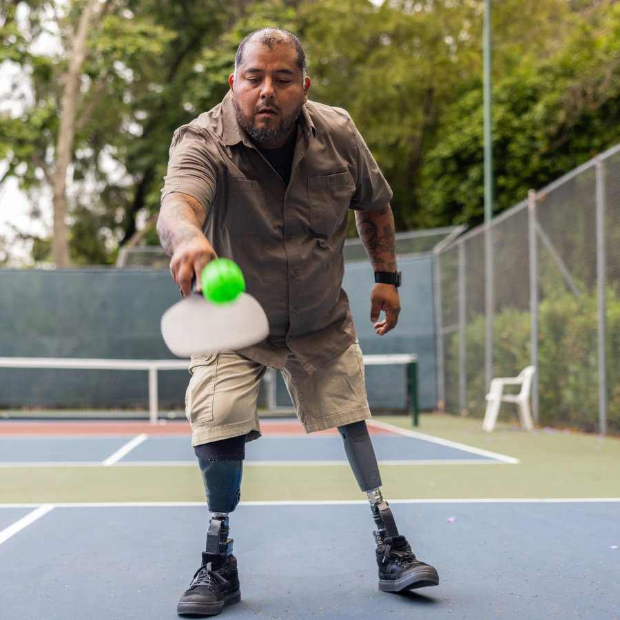 A man playing pickleball